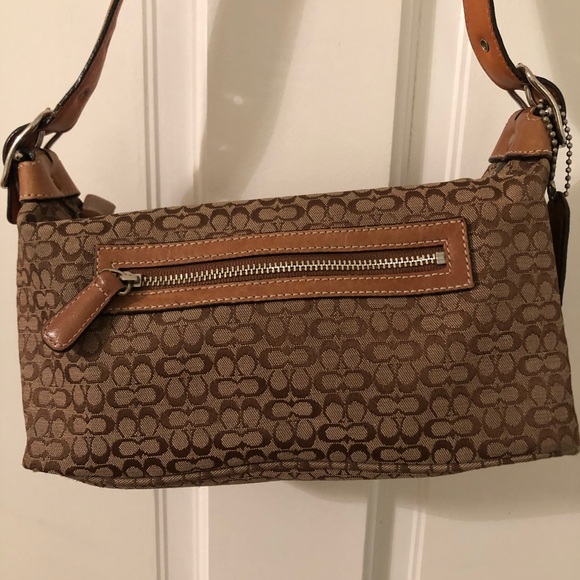 Coach Handbags - Coach brown purse size 9”L x 4.2”W x 4.75”H.